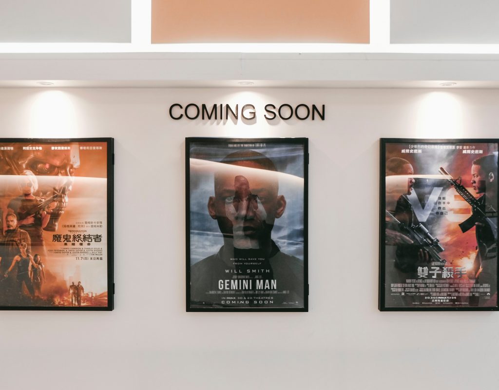three assorted-title movie posters